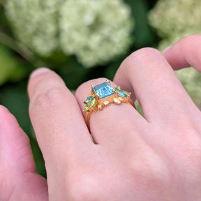 Blooming 1CT Emerald Cut Blue Gemstone Leafy Halo Engagement Ring