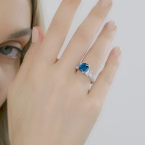 Dissoo® Sapphire Blue Emerald Cut 3-Stone Ring