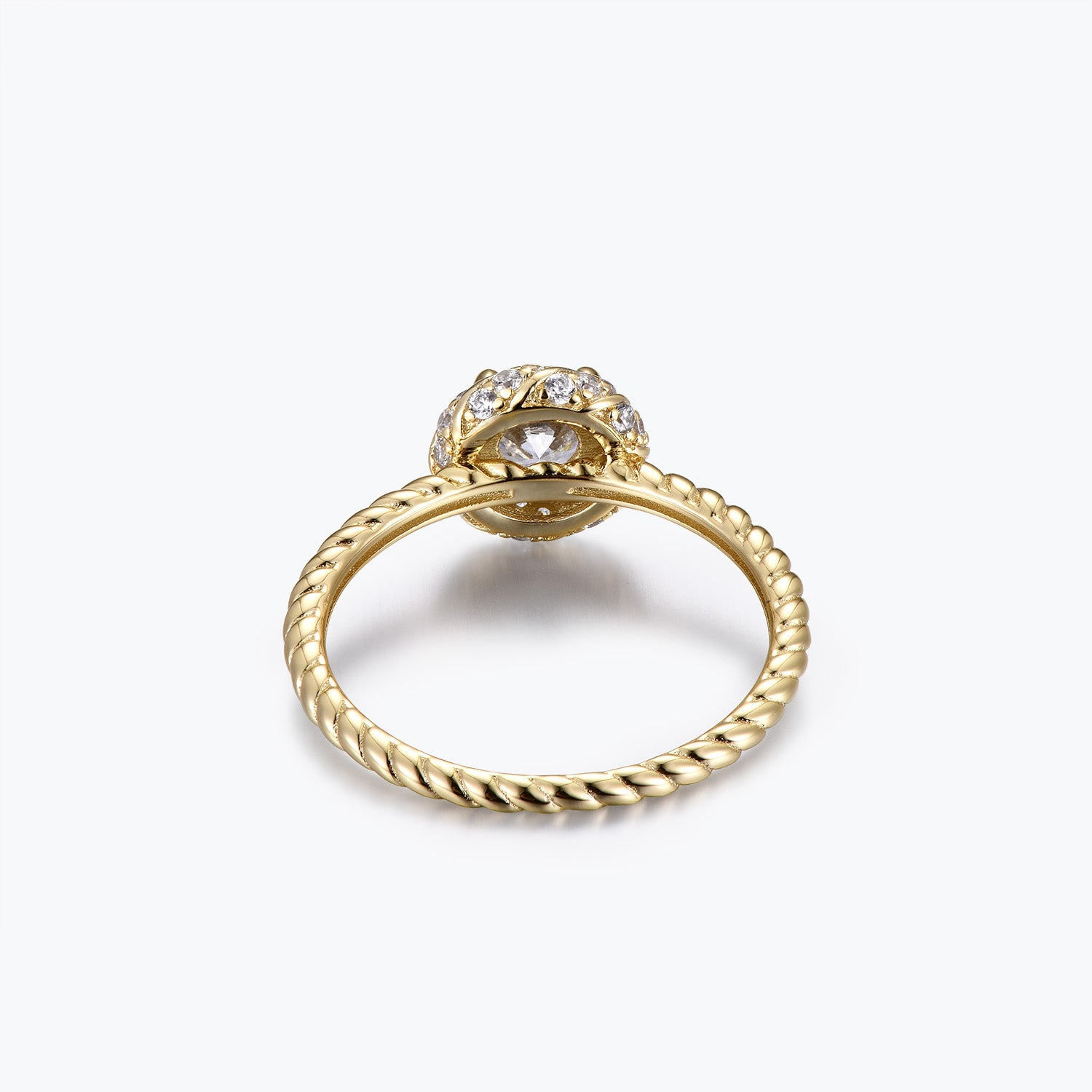 Bague de fiançailles Dissoo® en or jaune, sertie d'un halo torsadé et d'une moissanite.