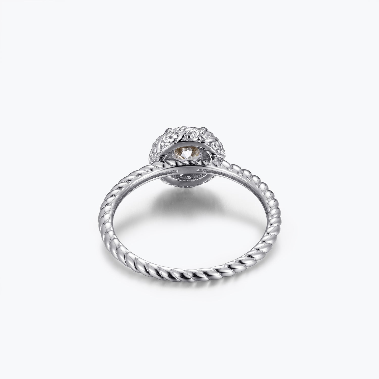 Bague de fiançailles Dissoo® en or jaune, sertie d'un halo torsadé et d'une moissanite.