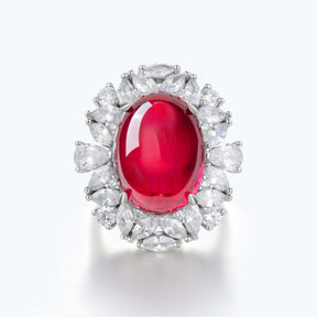 Dissoo® Oval Ruby Sterling Silver Cocktail Ring with Antique-style Flower-shaped Diamond Halo